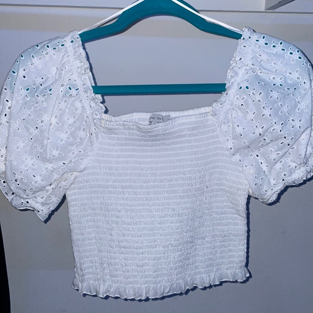Super cute and stretchy white off the shoulder shirt